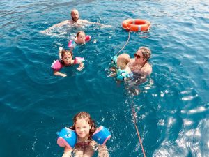 Young family swim, snorkel & sightseeing trip
